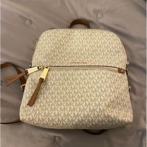 Authentic Michael Kors mini backpack. Perfect condition. Used for a few months.